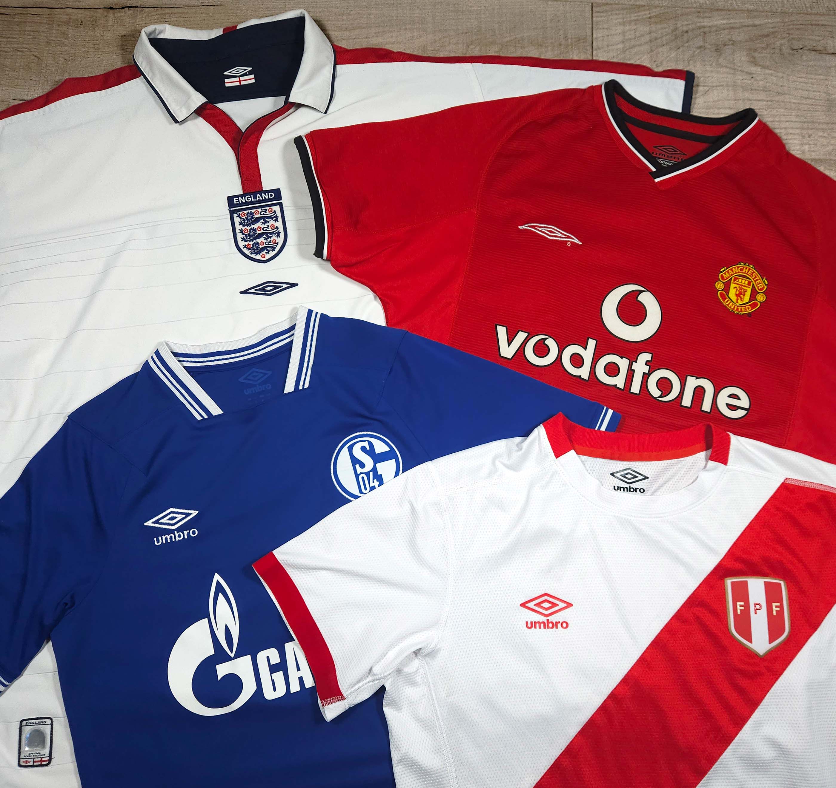 Umbro football shirts from different eras used for fake vs real comparison