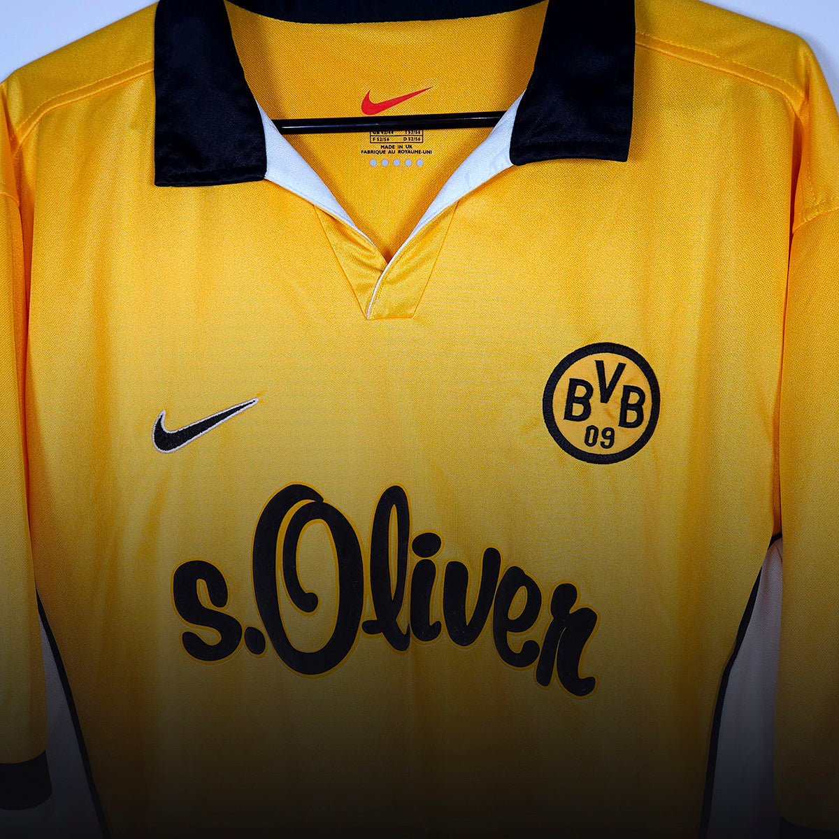 Borussia Dortmund yellow home football shirt Nike with black collar and BVB 09 crest detail and s.Oliver sponsor