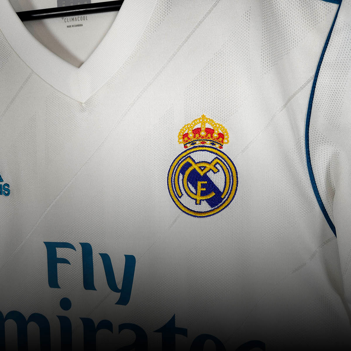 Real Madrid home shirt crest detail on white adidas jersey